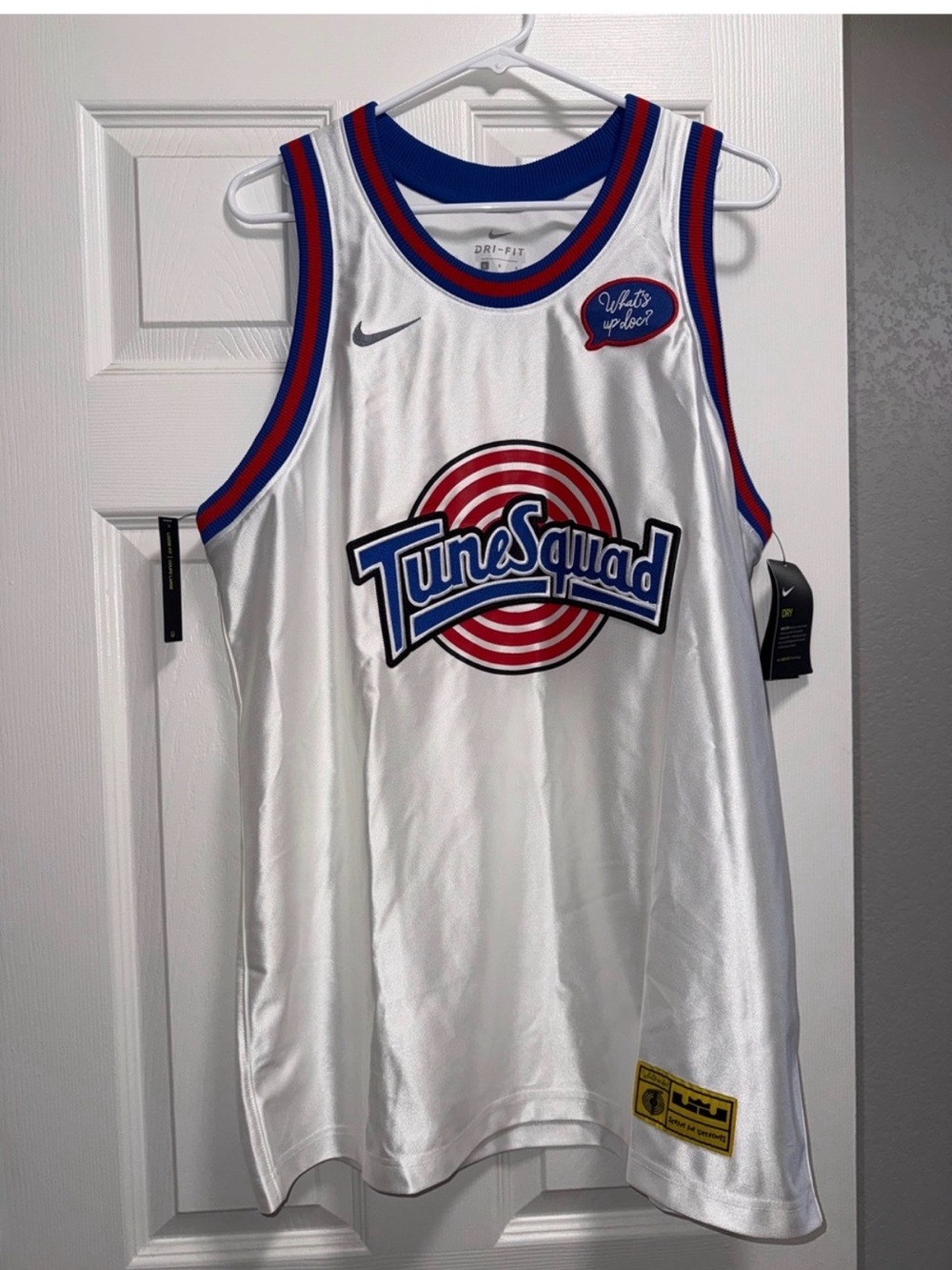 Nike White Tune Squad Basketball Jersey with Red and Blue Trim